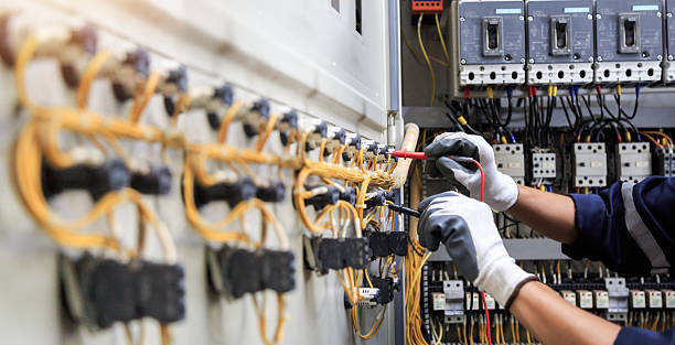 Professional Electrician technician working in Robertsville, NJ